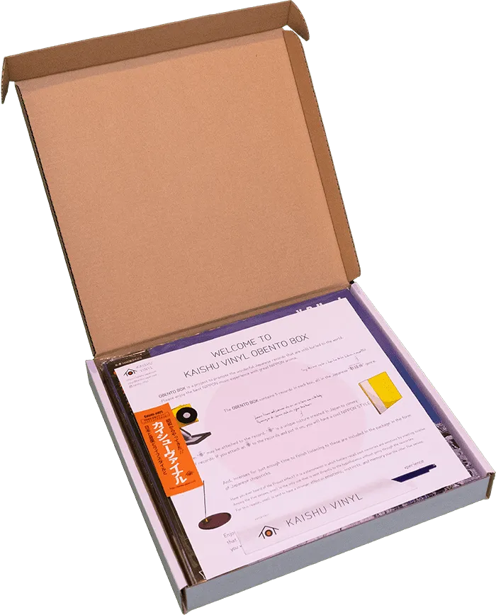 Inside view of OBENTO BOX with open packaging showing vinyl records and incense